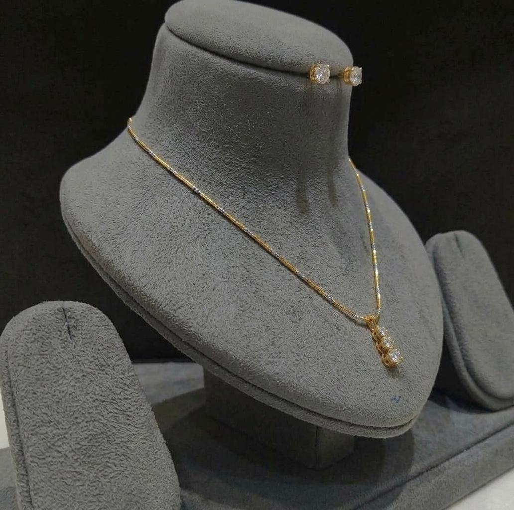 The Trillium Drop: Two-Tone Station Chain & Solitaire Trio Pendant Suite