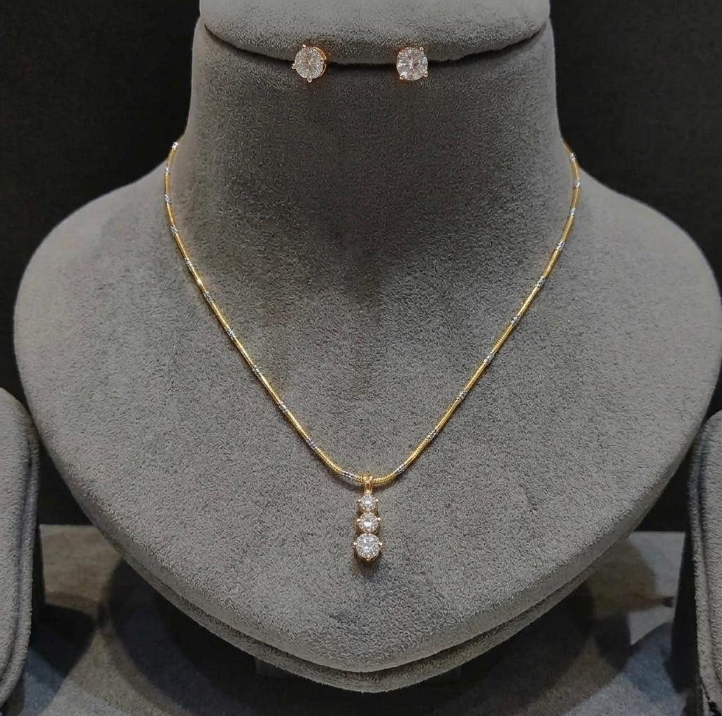 The Trillium Drop: Two-Tone Station Chain & Solitaire Trio Pendant Suite